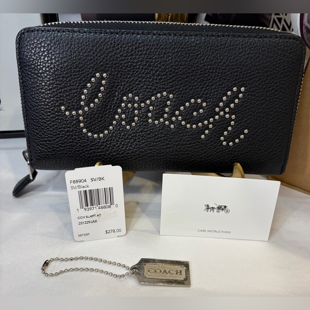 NWT COACH LIMITED EDITION STUDDED SCRIPT ZIPPER WALLET
7.5" (L) × 4" (H) - Picture 2 of 13